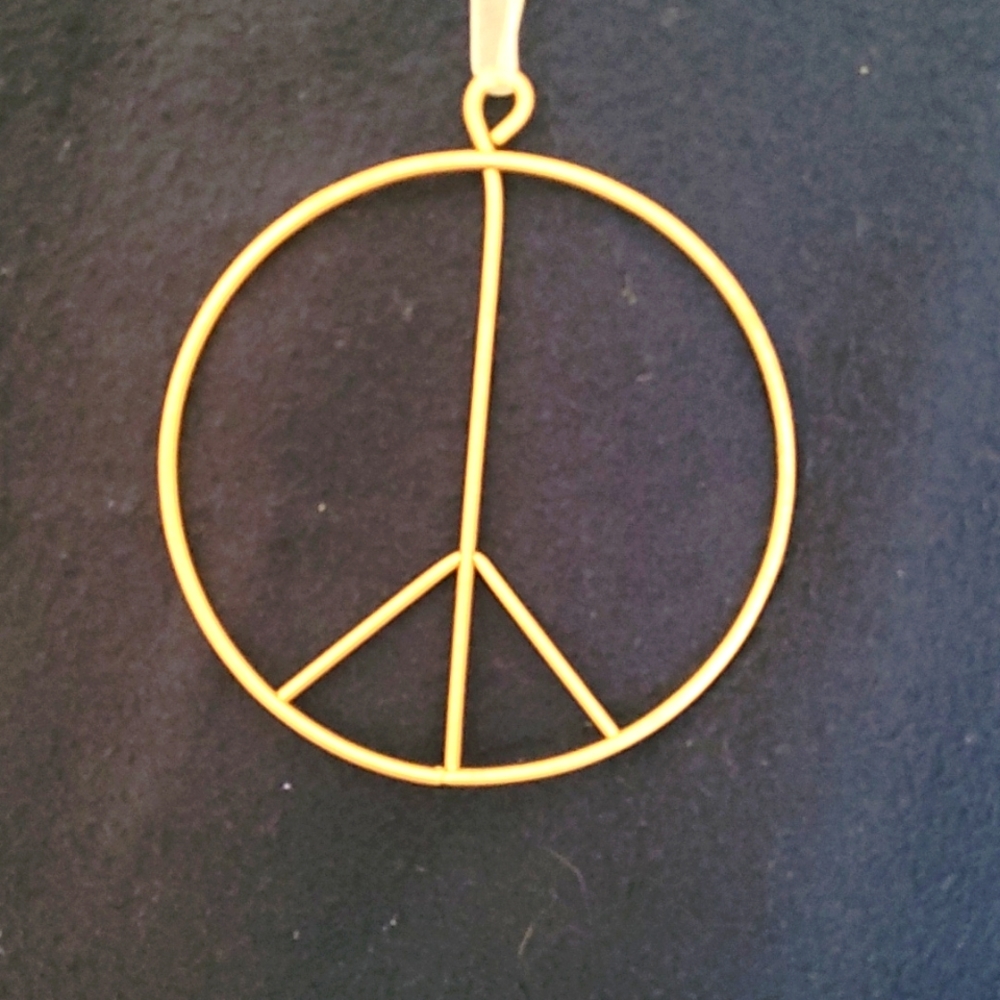 PLOW AND HEARTH METAL Peace sign ornament, gold tone, 4 in diameter.
